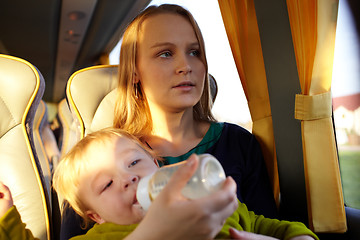 Image showing Mother with kid in the bus.
