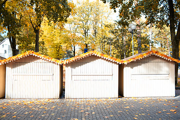 Image showing Three small wooden houses