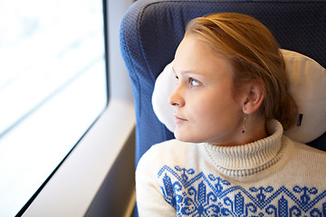 Image showing Young woman in the train.