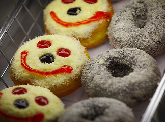 Image showing Doughnuts on a shelf of pastry shop