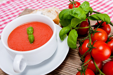 Image showing tasty fresh tomato soup basil and bread