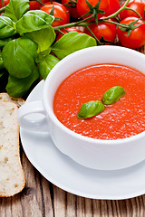 Image showing tasty fresh tomato soup basil and bread