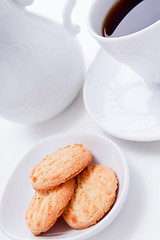 Image showing dark coffee in cup homemade cookie on table