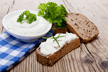 Image showing yoghurt creamy cheese with herbs and bread