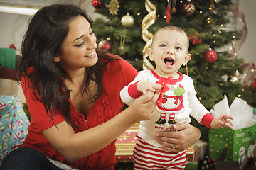 Image showing Ethnic Woman With Her Newborn Baby Christmas Portrait