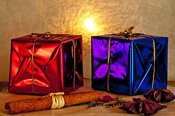 Image showing christmas gifts with frozen window