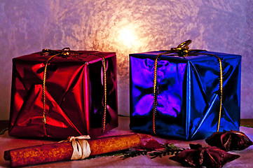 Image showing christmas gifts with frozen window