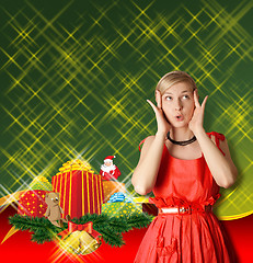Image showing Woman In Red With Christmas Gifts
