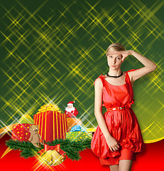 Image showing Woman In Red With Christmas Gifts