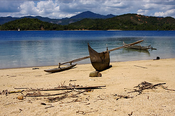 Image showing  madagascar nosy be boat palm  rock stone branch  lagoon and coa