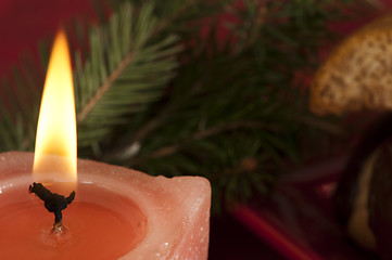 Image showing Christmas candle on the festive table