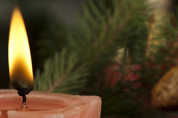 Image showing Christmas candle on the festive table