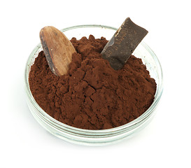 Image showing Cocoa bean, cocoa powder in bowls and piece of chocolate