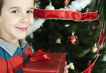 Image showing Happy child receive the gift of Christmas