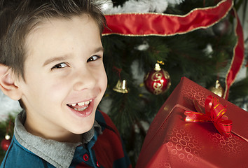 Image showing Happy child receive the gift of Christmas