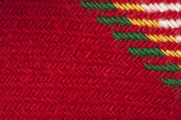 Image showing Handmade knit green and red background