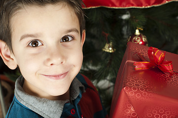 Image showing Happy child receive the gift of Christmas