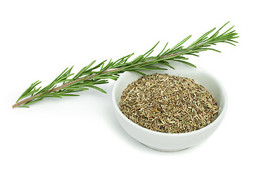 Image showing Fresh rosemary and a bowl with dried