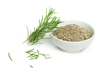 Image showing Fresh rosemary and a bowl with dried