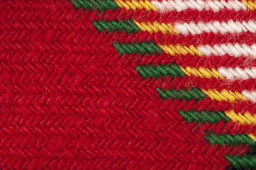 Image showing Handmade knit green and red background