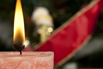 Image showing Christmas candle on the festive table