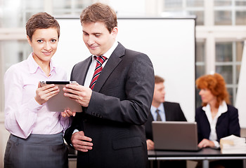 Image showing business team with tablet cellphone computer