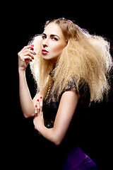 Image showing young pretty blonde woman with big hair fashion