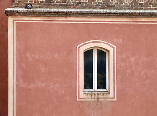 Image showing Single window on a red wall