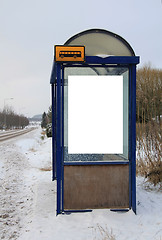 Image showing Bus Stop in Winter with Blank Billboard