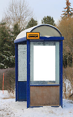 Image showing Bus Stop in Winter with Blank Billboard