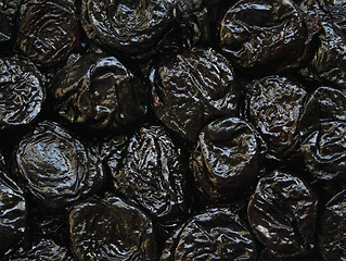 Image showing Dry plums or prunes fruit as background