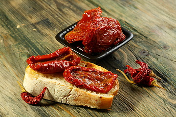 Image showing Fresh bread with sun-dried tomatoes.