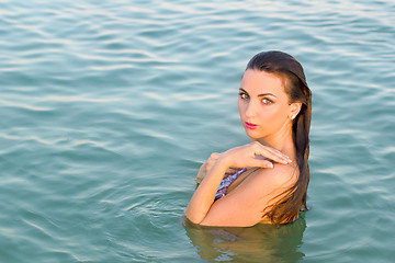 Image showing nice wet young woman in the water