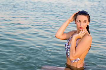 Image showing cute young woman in the water