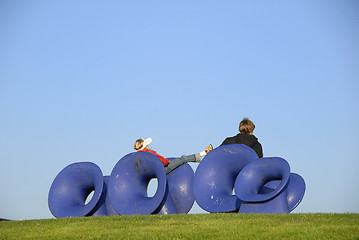 Image showing Young Girl and boy Playing