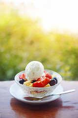 Image showing Fruit salad with ice cream