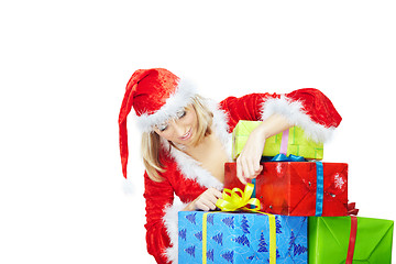 Image showing Santa opening Xmas gifts