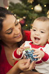Image showing Ethnic Woman With Her Mixed Race Baby Christmas Portrait