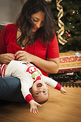 Image showing Ethnic Woman With Her Mixed Race Baby Christmas Portrait