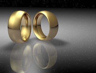 Image showing Two wedding ring on a night sky background