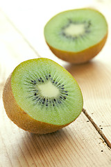 Image showing kiwi fruit on wooden table