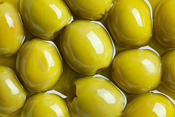 Image showing green olives in olive oil