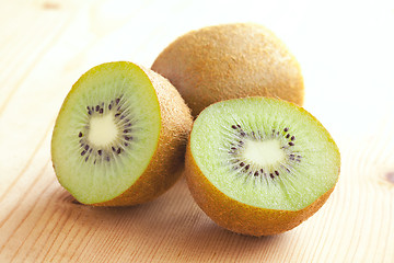 Image showing kiwi fruit on wooden table