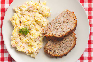 Image showing baked meatloaf with potato salad