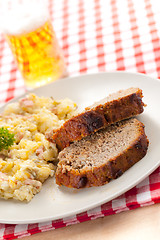 Image showing baked meatloaf with potato salad