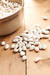 Image showing white beans on wooden table