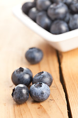 Image showing blueberries on wooden table