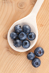 Image showing blueberries on wooden table