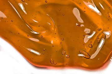 Image showing Bubbles in honey