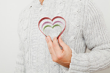 Image showing Heart symbols held in hand